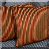 D064. Pair of striped pillows.
